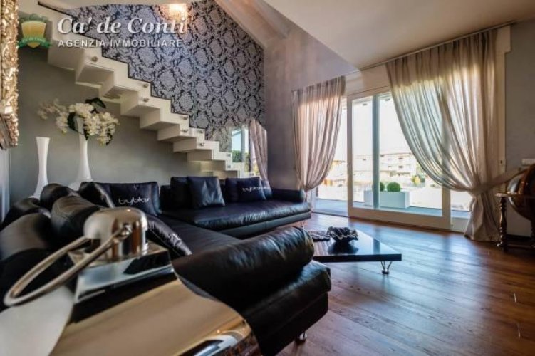 ELEGANTE ATTICO CON SOLARIUM E PISCINA SUL TETTO