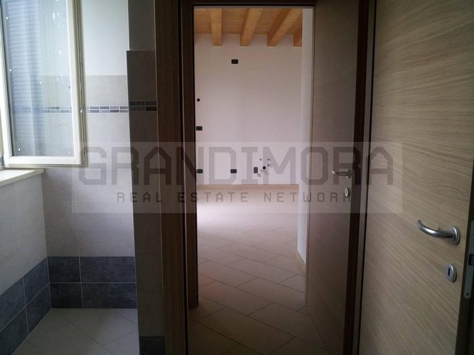 BILOCALE CON GIARDINO NUOVO CLASSE B Oltre il Colle