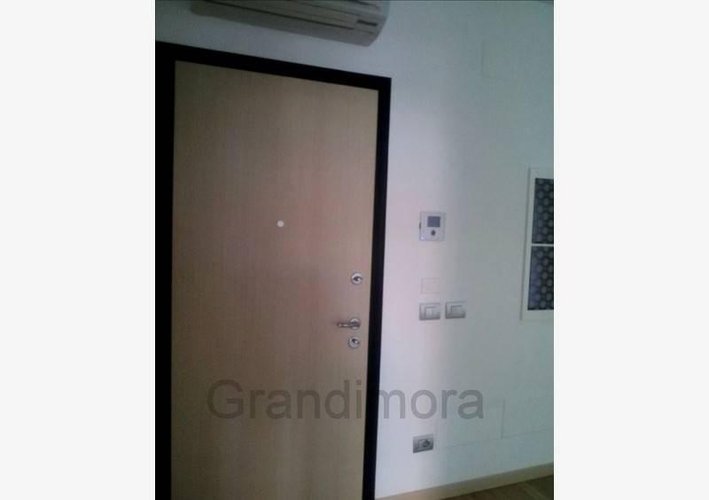 in contesto lusso bilocale con patio coperto e giardino Bergamo