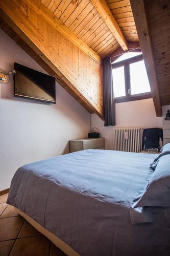 Bilocale mansardato in recente minipalazzina a piano ultimo. Bergamo