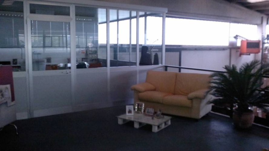 CAPANNONE CON SALONE ESPOSITIVO E 1500 MQ. DI CORTILE Mozzo