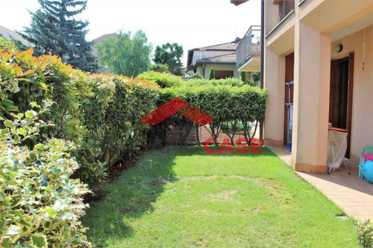 Bilocale con giardino e box