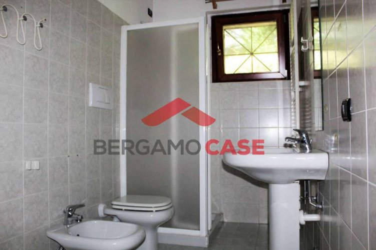 Bilocale con giardino e box Bergamo