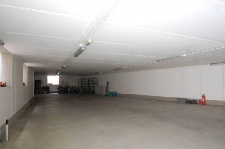 1067 SERIATE due quadrilocali in edificio con capannone Seriate