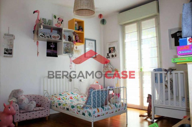 Trilocale con giardino e box Bergamo