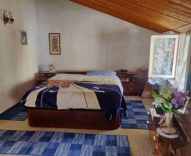 Villetta a schiera di testa con giardinetto Albino