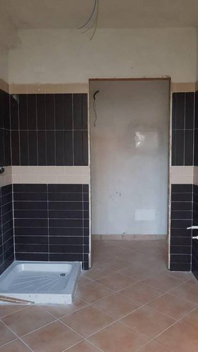 monolocale ristrutturato piano terra con ampie vetrate Solza