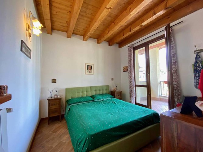 OCCASIONE!!!QUADRILOCALE CON PISCINA.FRONTE LAGO. Spinone al Lago