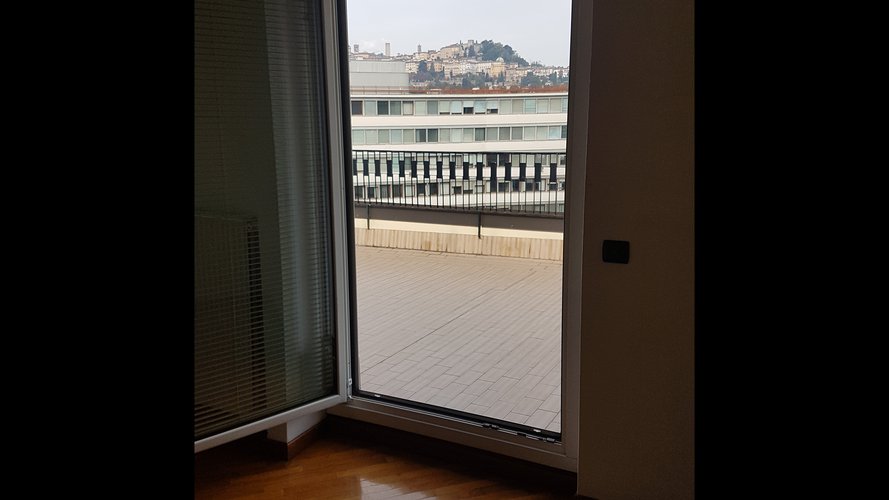 Attico. Via Malj Tabajani. Vista città alta. Bergamo