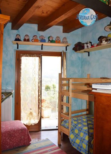 Trilocale con piccolo giardino e taverna vivibile Albino