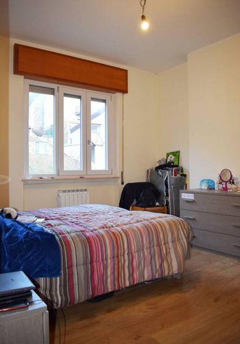 Vendesi quadrilocale ristrutturato con box Albino