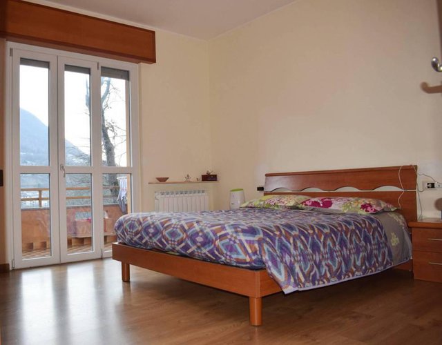 Vendesi quadrilocale ristrutturato con box Albino