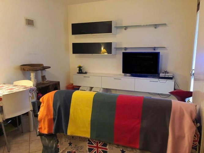 Bilocale con giardino privato e box Cene