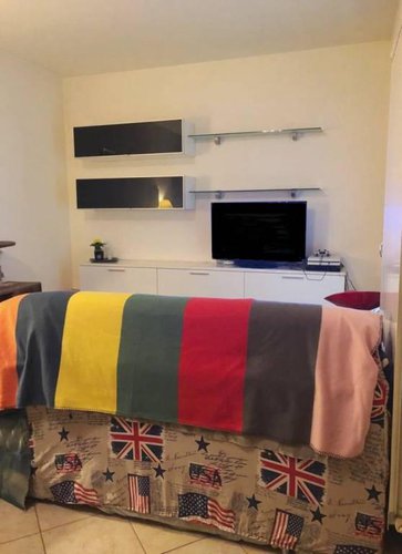 Bilocale con giardino privato e box Cene