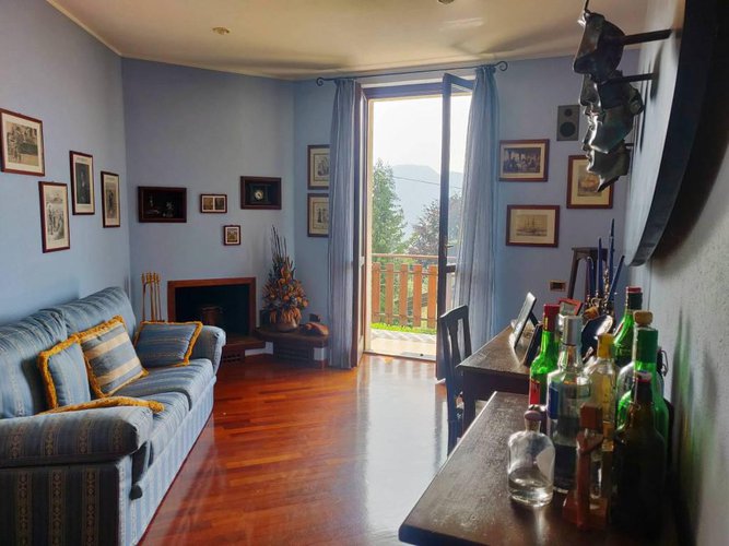 Villetta a schiera immersa nel verde Albino