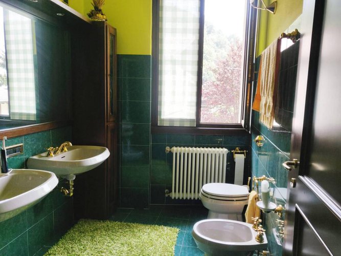 Villetta a schiera immersa nel verde Albino