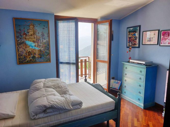 Villetta a schiera immersa nel verde Albino