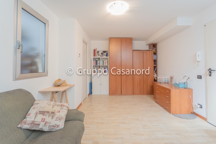 2 locali con taverna, portico e giardino - Box Brembate