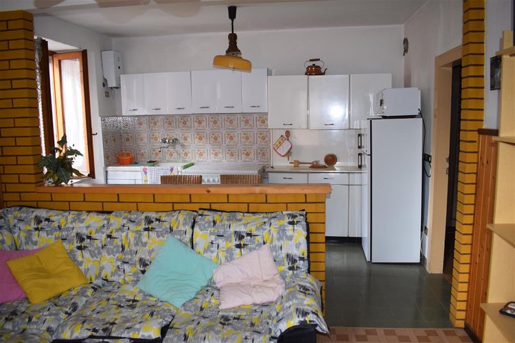 Serina, in suggestiva casa d’epoca, grazioso trilocale esente da spese condominiali Serina