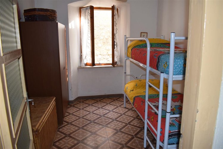 Serina, in suggestiva casa d’epoca, grazioso trilocale esente da spese condominiali Serina