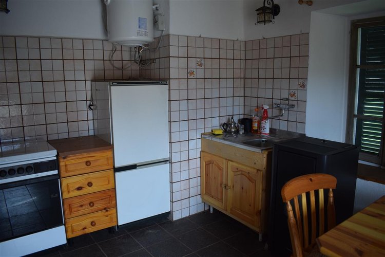 Serina, in casa d’epoca, centralissimo trilocale esente da spese condominiali Serina