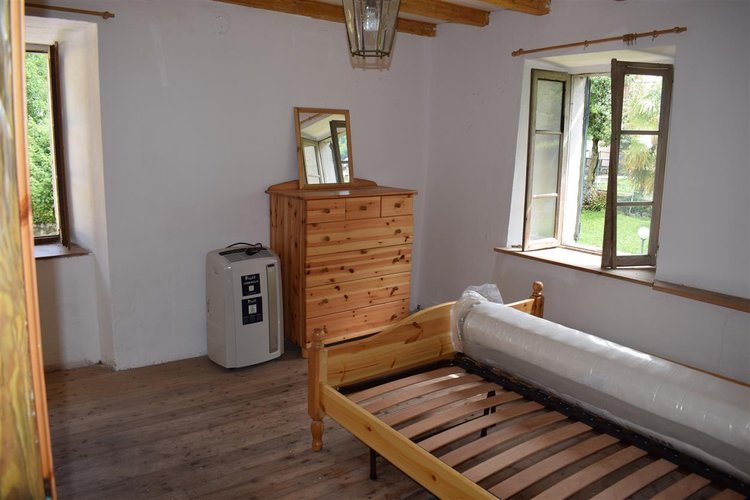 Serina, in casa d’epoca, centralissimo trilocale esente da spese condominiali Serina