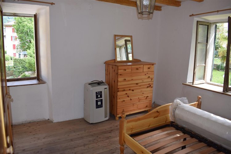 Serina, in casa d’epoca, centralissimo trilocale esente da spese condominiali Serina