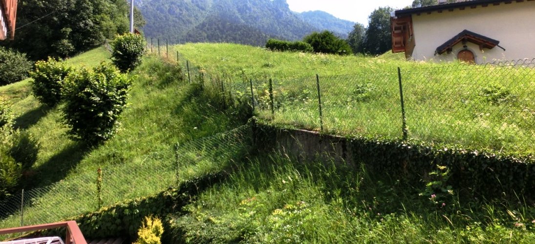 Serina-Valpiana, nel verde in elegante palazzina, bilocale balconato con box Serina