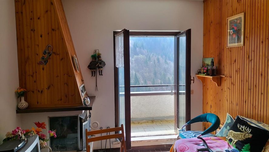 Oltre il Colle, immerso nel verde, panoramico bilocale con box auto Oltre il Colle