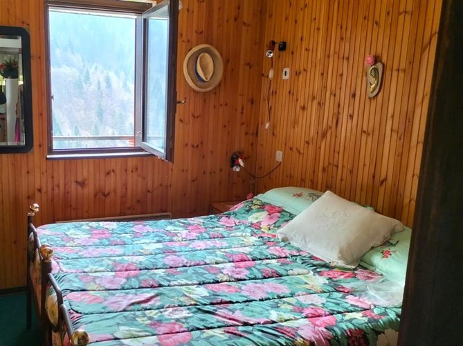 Oltre il Colle, immerso nel verde, panoramico bilocale con box auto