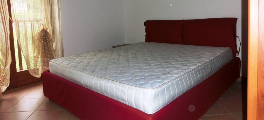 Serina in tipico chalet montano, ottimo trilocale con giardino Serina